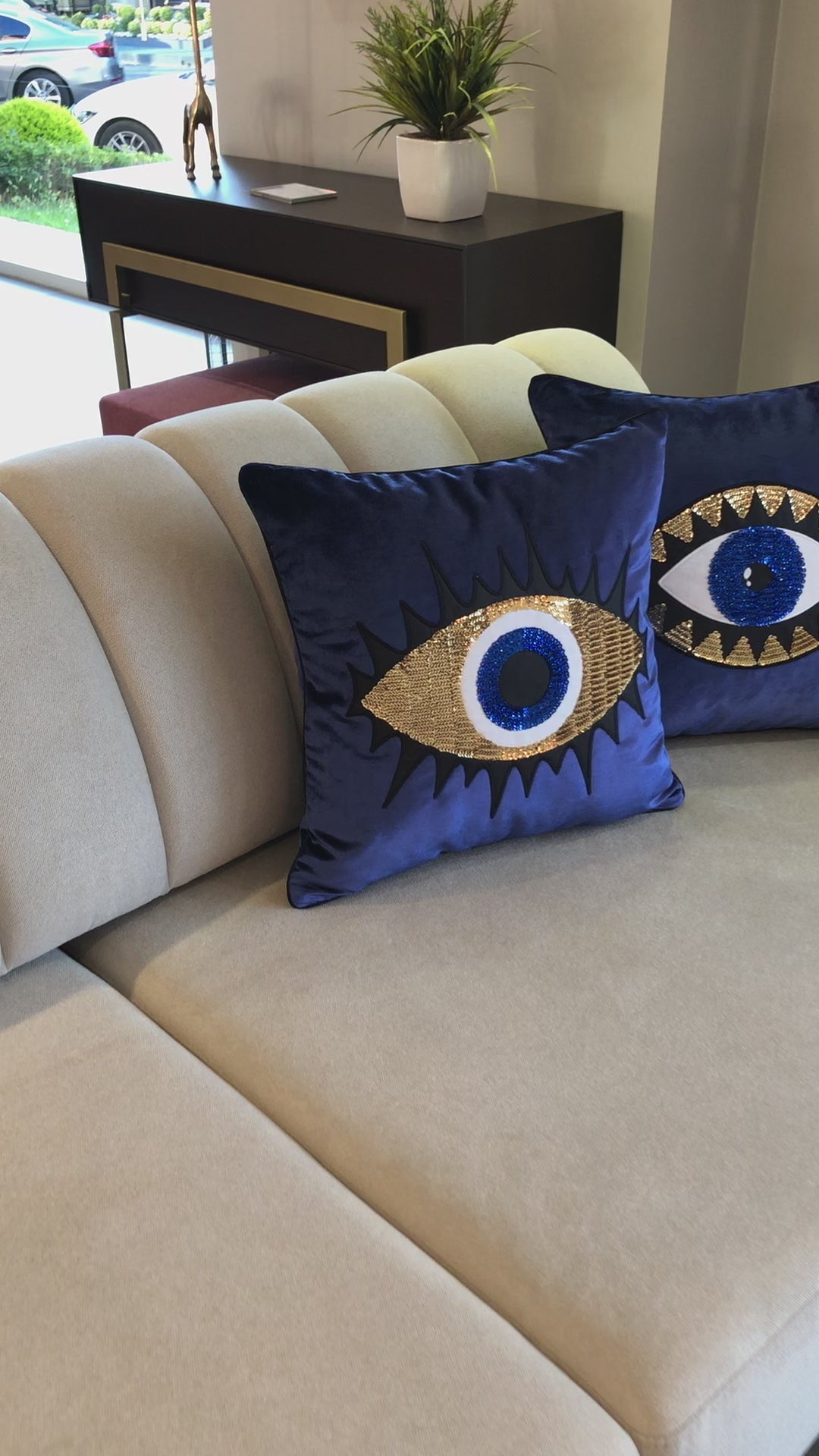 Luxurious midnight blue velvet pillow covers with elegant evil eye embroidery, perfect for adding style and protection to your home decor.